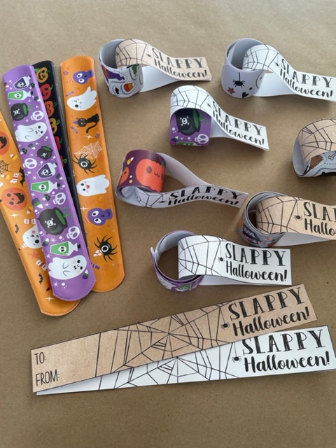 slappy halloween tag strips to loop through a slap bracelet, non-food halloween party ideas DIY